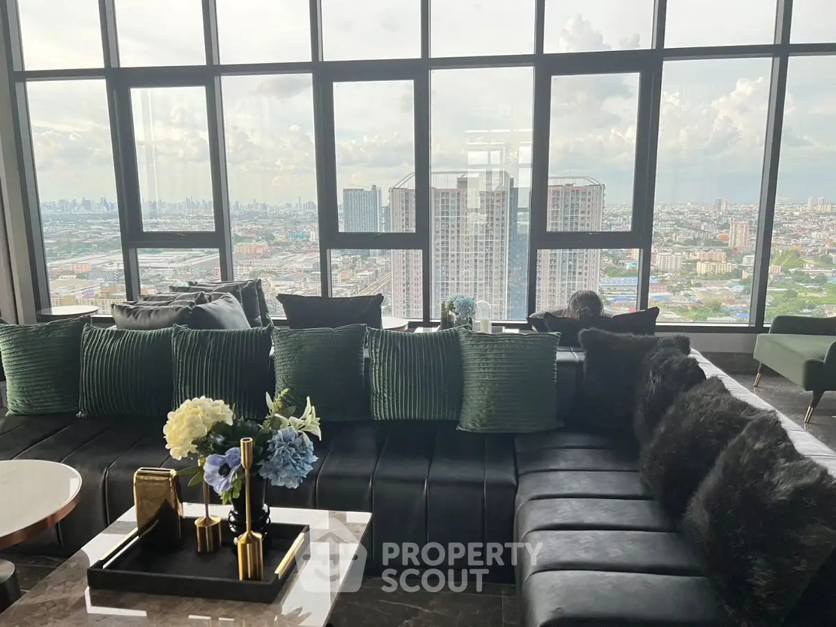 Luxurious living room with panoramic city view and elegant decor