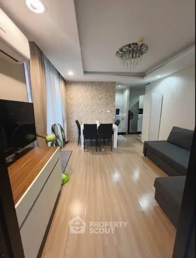 Modern living room with elegant dining area and stylish decor