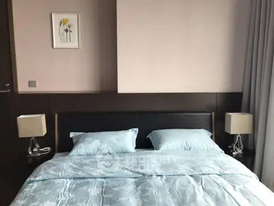 Elegant bedroom with modern decor and soft lighting