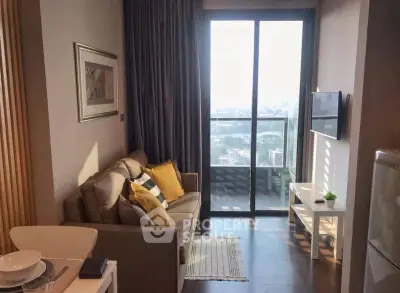 Cozy living room with balcony view in modern apartment