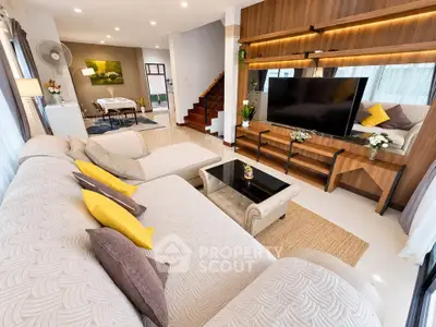 Spacious modern living room with elegant decor and large sectional sofa