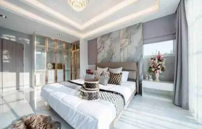 Luxurious modern bedroom with elegant decor and natural light