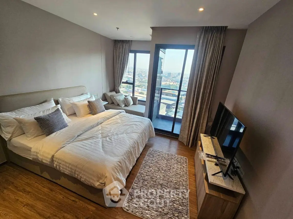 Luxurious bedroom with stunning city view and modern decor