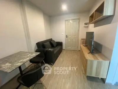 Cozy modern living room with sleek furniture and wooden flooring