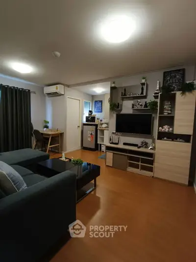 Modern living room with stylish decor and entertainment center