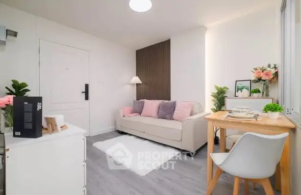 Charming living room with cozy decor and modern furniture, perfect for relaxation and entertaining.