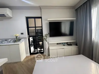 Modern living room with sleek TV setup and stylish decor