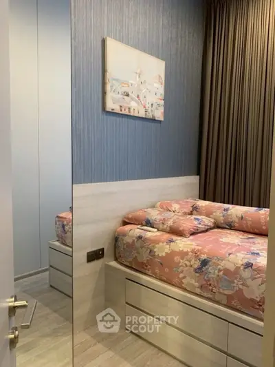 Cozy bedroom with floral bedding and modern decor