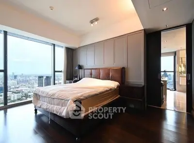 Luxurious bedroom with stunning city view and elegant decor