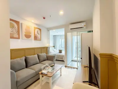 Modern living room with cozy sofa and stylish decor in a bright apartment