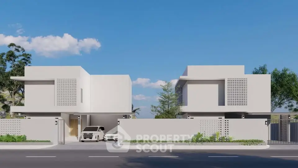 Modern minimalist duplex with sleek white facade and spacious driveway in a serene neighborhood.