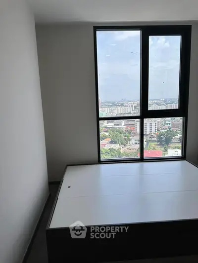 Bright and airy corner unit with expansive windows offering a stunning city view, perfect for a serene urban retreat.