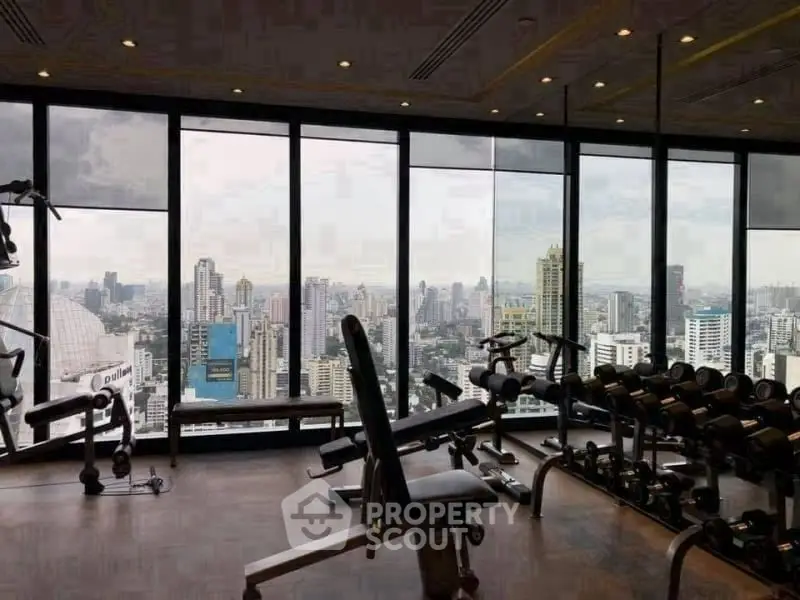 Luxury gym with panoramic city views and modern equipment