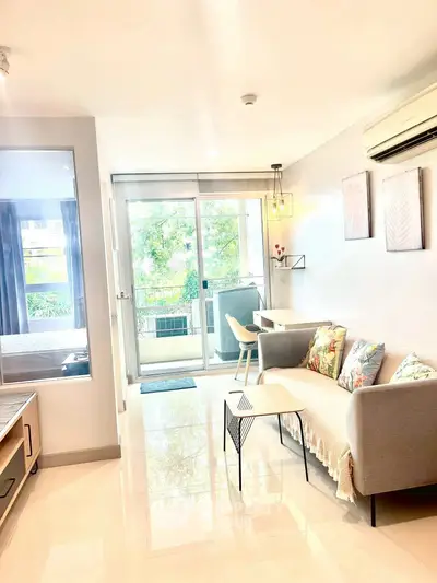 Bright modern living room with balcony view and stylish decor
