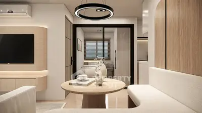 Modern living room with elegant decor and cozy seating area, featuring a stylish round table and contemporary lighting.