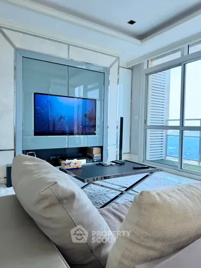 Luxurious living room with modern decor and stunning city view