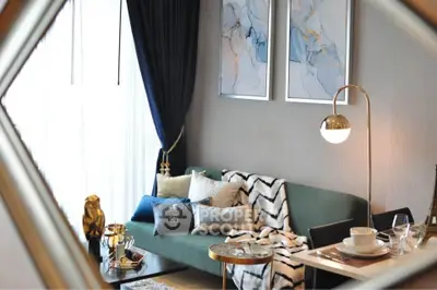 Stylish modern living room with elegant decor and cozy seating area.