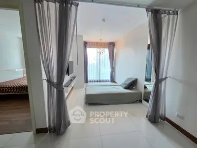 Modern bedroom with elegant curtains and sleek design in a stylish apartment