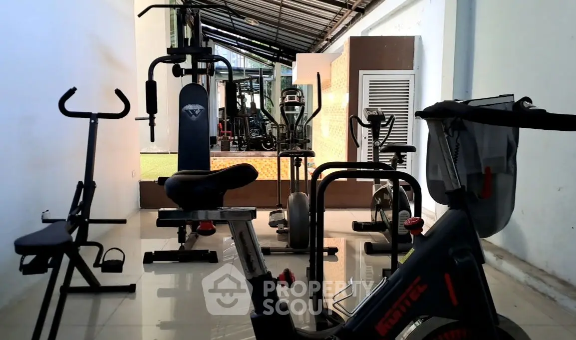 Modern home gym with exercise equipment and sleek design