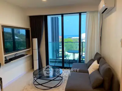 Modern living room with balcony view and stylish furniture