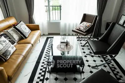 Stylish modern living room with elegant furniture and natural light