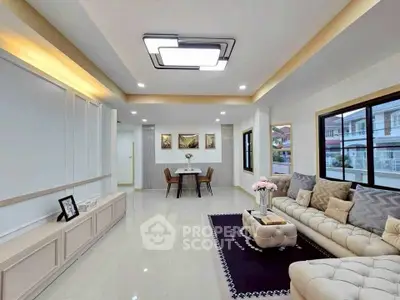 Spacious modern living room with elegant decor and ample natural light