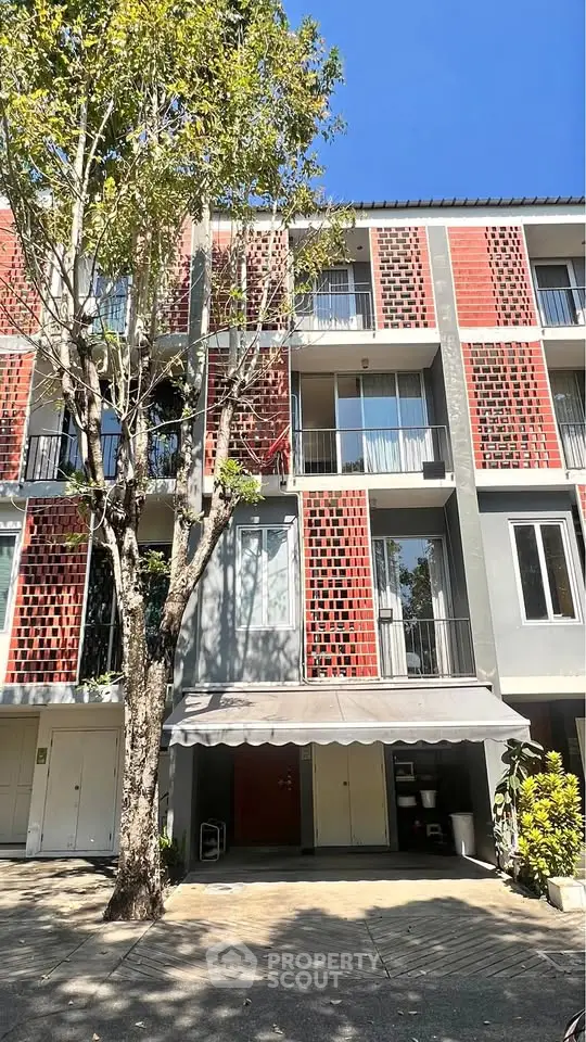 Modern apartment building with unique facade and balconies