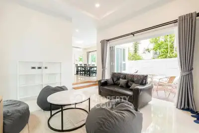 Spacious modern living room with open layout and outdoor access