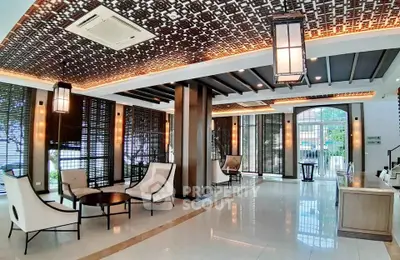 Luxurious modern living room with elegant decor and ambient lighting