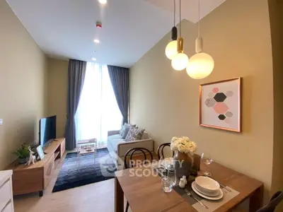 Modern living room with elegant dining area and stylish decor