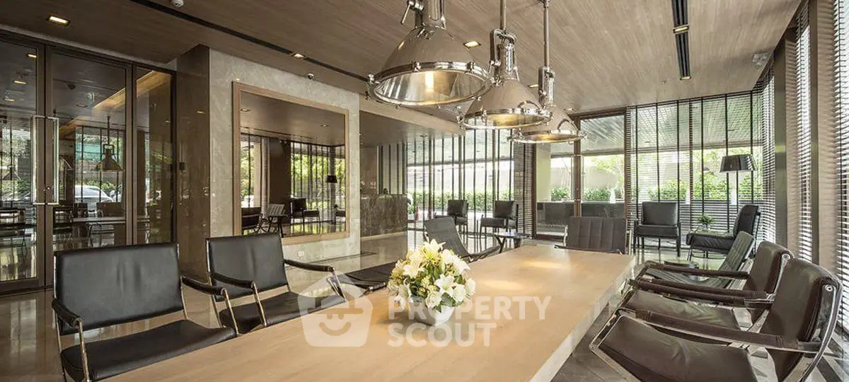 Luxurious modern office space with elegant lighting and sleek furniture, perfect for professional meetings.