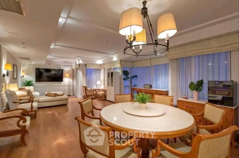 Luxurious living room with elegant dining area and ambient lighting