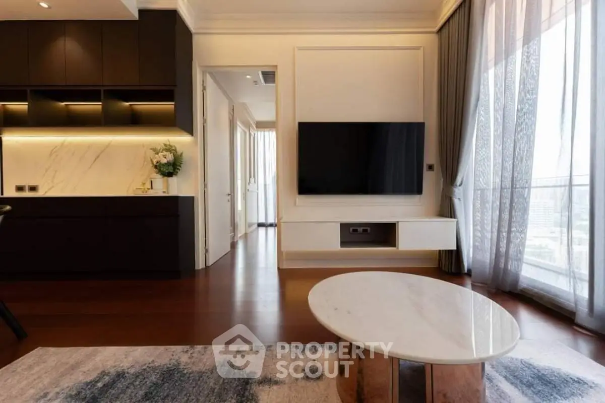Luxurious modern living room with sleek design and large window view