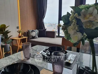 Stylish modern living room with city view, elegant decor, and dining setup, perfect for urban living.