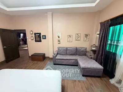 Spacious living room with modern decor and cozy sectional sofa