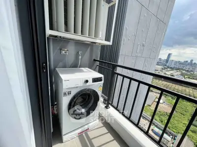 Modern balcony with washing machine and city view