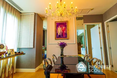 Elegant dining room with chandelier and modern decor