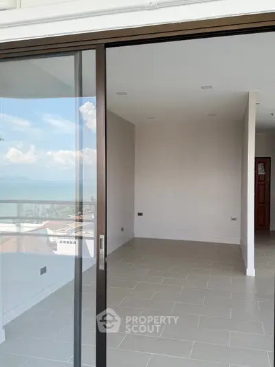 Spacious modern apartment with stunning ocean view and large balcony.