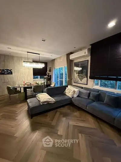 Spacious living room with modern decor and large sectional sofa