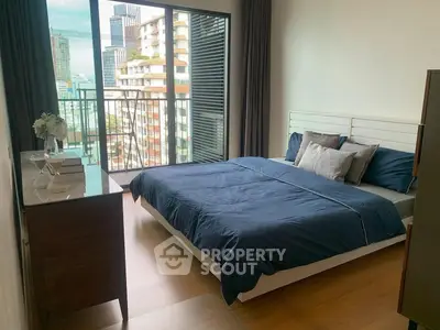 Modern bedroom with city view and stylish decor in urban apartment