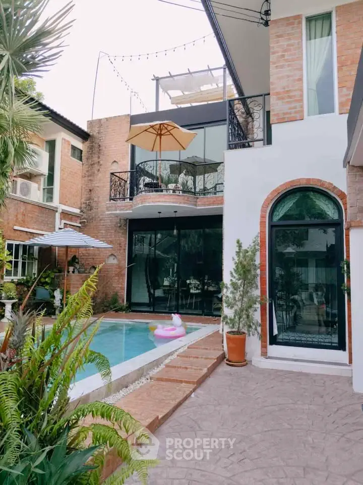 Charming modern home with pool and balcony, perfect for relaxation and entertaining.