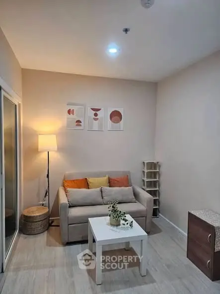 Cozy living room with modern decor and soft lighting, perfect for relaxation.