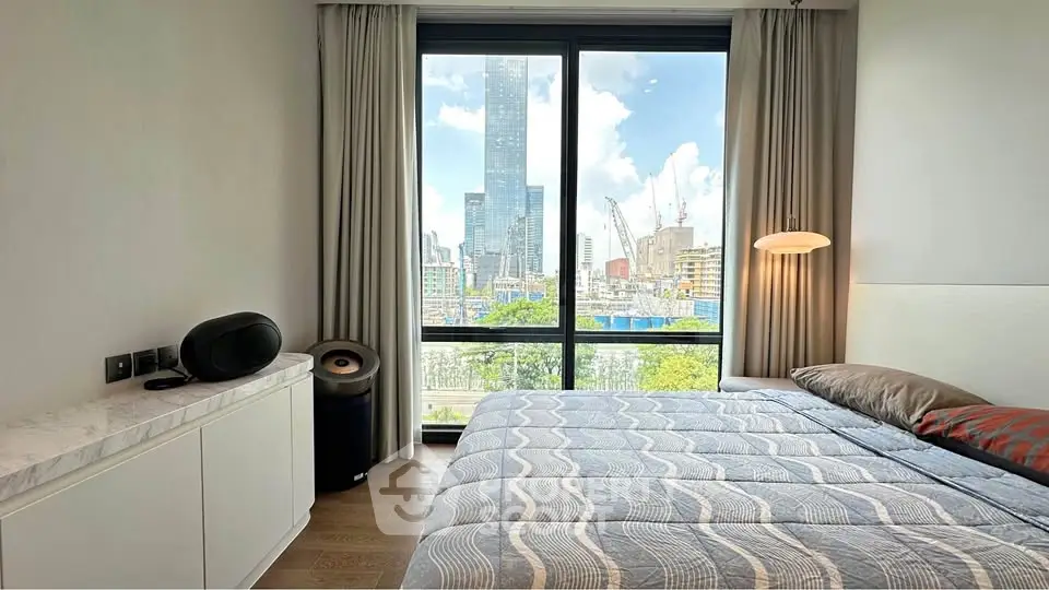 Modern bedroom with stunning city view and elegant decor