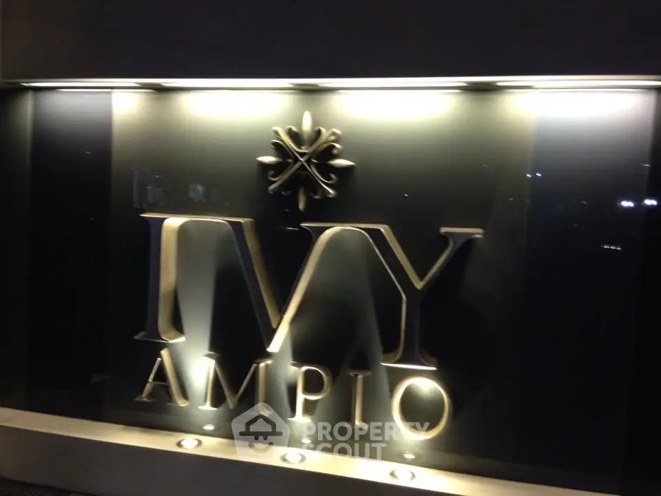 Elegant Ivy Ampio building sign with modern lighting
