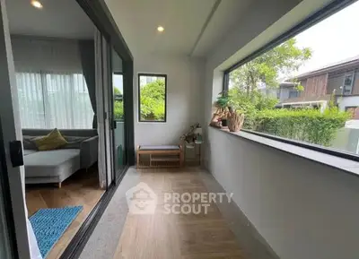Spacious balcony with garden view and modern decor