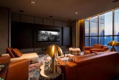 Luxurious living room with leather sofas and city skyline view