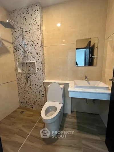 Modern bathroom with sleek fixtures and stylish tile design