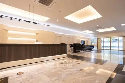 Luxurious modern lobby with elegant marble flooring and stylish lighting