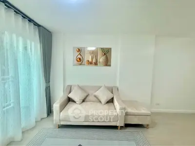 Modern living room with elegant sofa and stylish decor in bright apartment