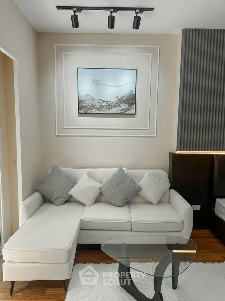 Modern living room with stylish sectional sofa and elegant decor